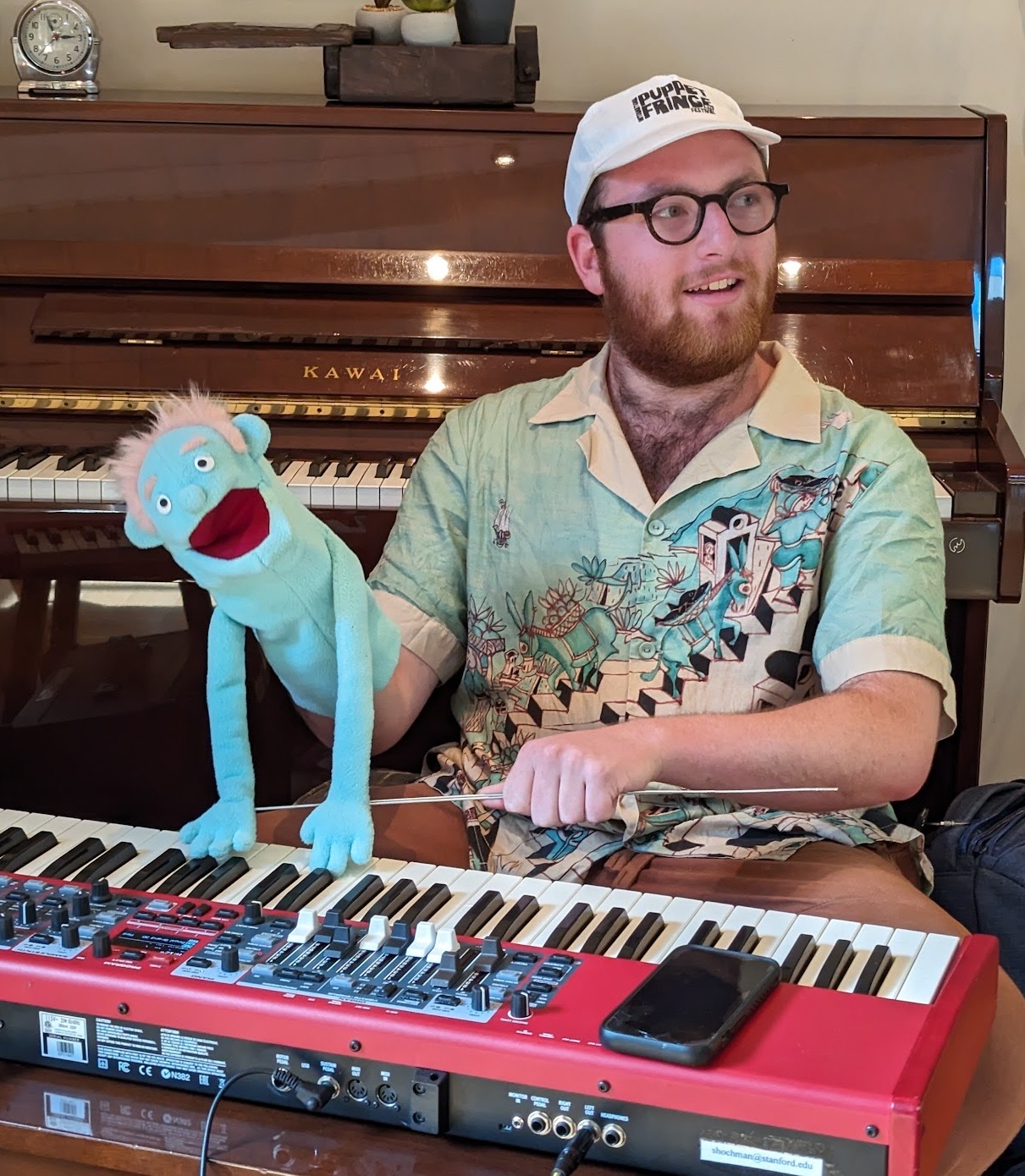Headshot of Sebastian Blue Hochman at a keyboard