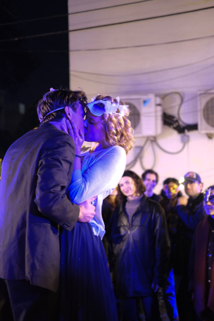 Romeo and Juliet kiss during the masked party