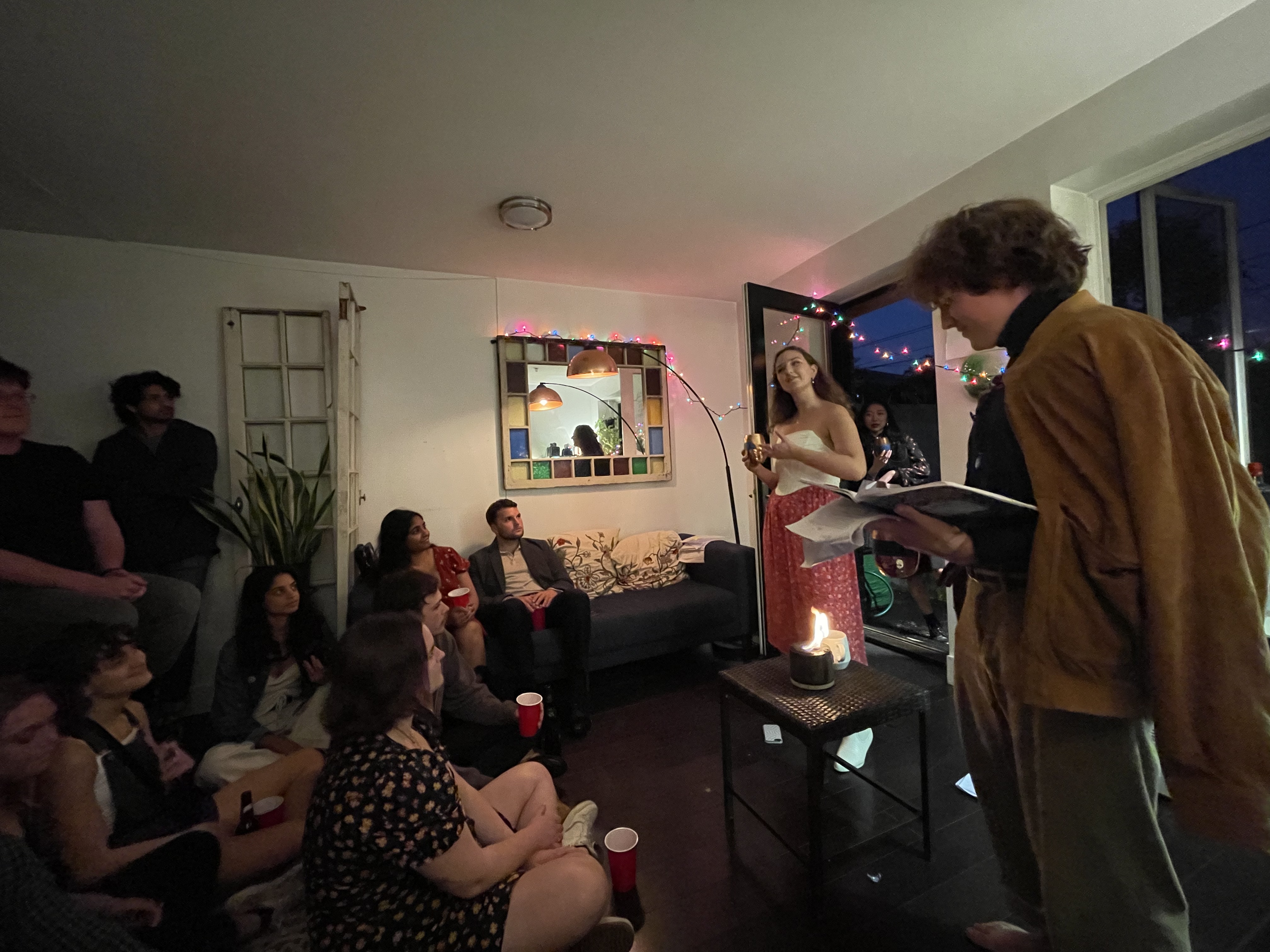 The Seagull audience and performers gathered inside a living room